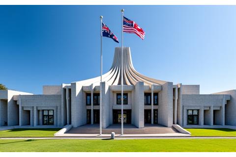 Australian Parliament House exterior with flags flying.